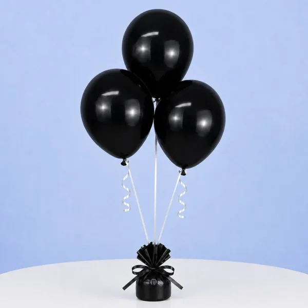 black-balloons_2026 A cluster of black balloons, symbolizing sophistication and somberness, suitable for various occasions.