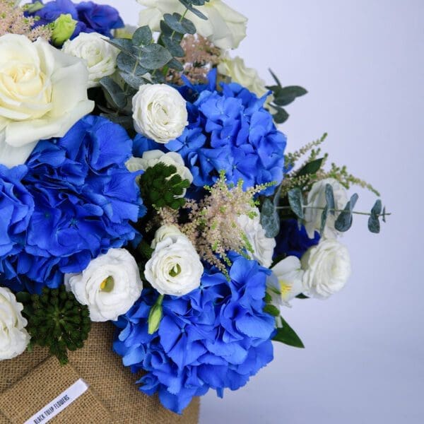 Azure and Ivory flower box by Black Tulip Flowers