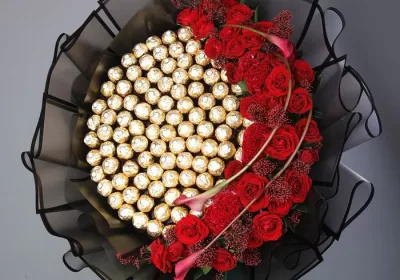 Ferrero Bouquet with Red Flowers by Black Tulip Flowers