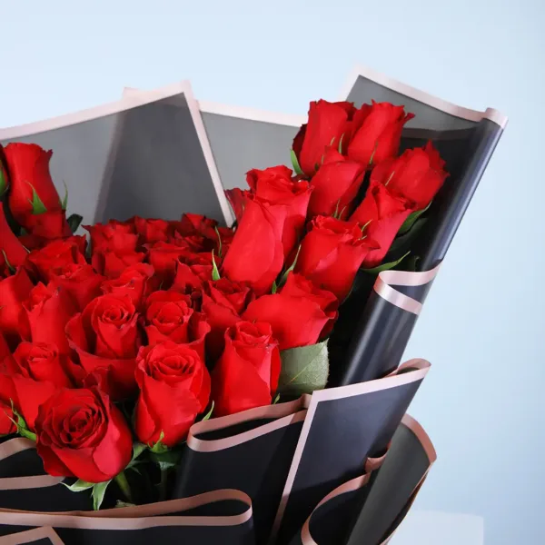 03-2 50 Red Roses Black Wrapped