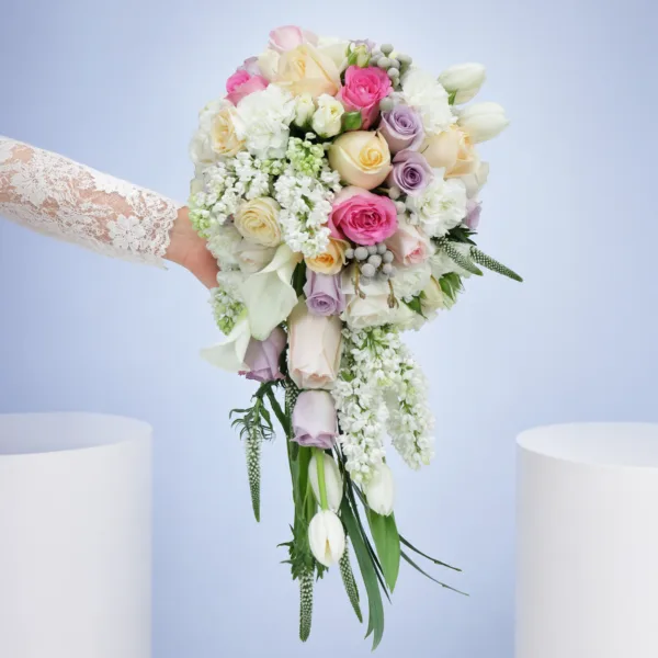 dreamy-pastel-romance-bouquet Dreamy Pastel Romance Bouquet featuring tulips, calla lilies, roses, lisianthus, veronica, brunia, and matthiola in soft pastel bridal styling