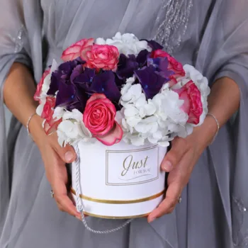 Premium Pastel Floral Box featuring white and dark purple hydrangeas with double color pink roses arranged in an elegant floral box