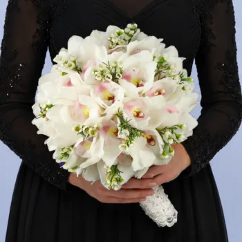 Timeless Orchid Wedding Bouquet featuring white cymbidium orchids and white wax flowers arranged in a soft romantic bridal design