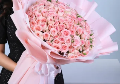 Pink Rose Passion Bouquet featuring 60 fresh pink roses and 40 peach spray roses arranged into a luxurious floral bouquet, perfect for birthdays, anniversaries, romantic occasions, and elegant gifting.