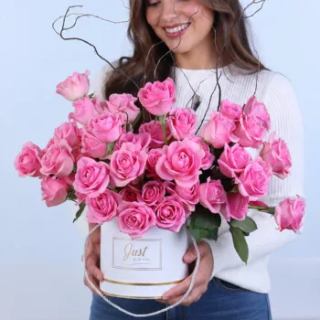 Pink Rose Romance Box featuring 40 fresh pink roses beautifully arranged in a round hat box, creating an elegant floral gift for birthdays, anniversaries, romantic occasions, and celebrations.