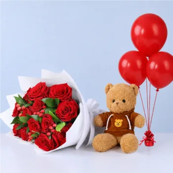 Romantic Red Rose Teddy Combo featuring fresh red roses, red balloons, a brown hoodie teddy bear, and premium floral wrapping for gifting in Qatar.
