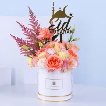 Elegant Eid Bloom Box featuring pink and peach roses with pink astilbe arranged in a white box with an Eid Mubarak topper for festive gifting