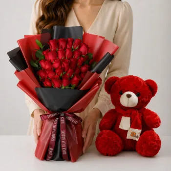 Red Roses Teddy Combo featuring 25 red roses with ruscus greenery paired with a 50cm red teddy bear for romantic gifting