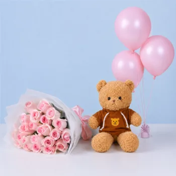 Birthday Rose Teddy Combo featuring light pink Titanic roses, a brown hoodie teddy bear, pink balloons, and premium floral wrapping for birthday gifting.